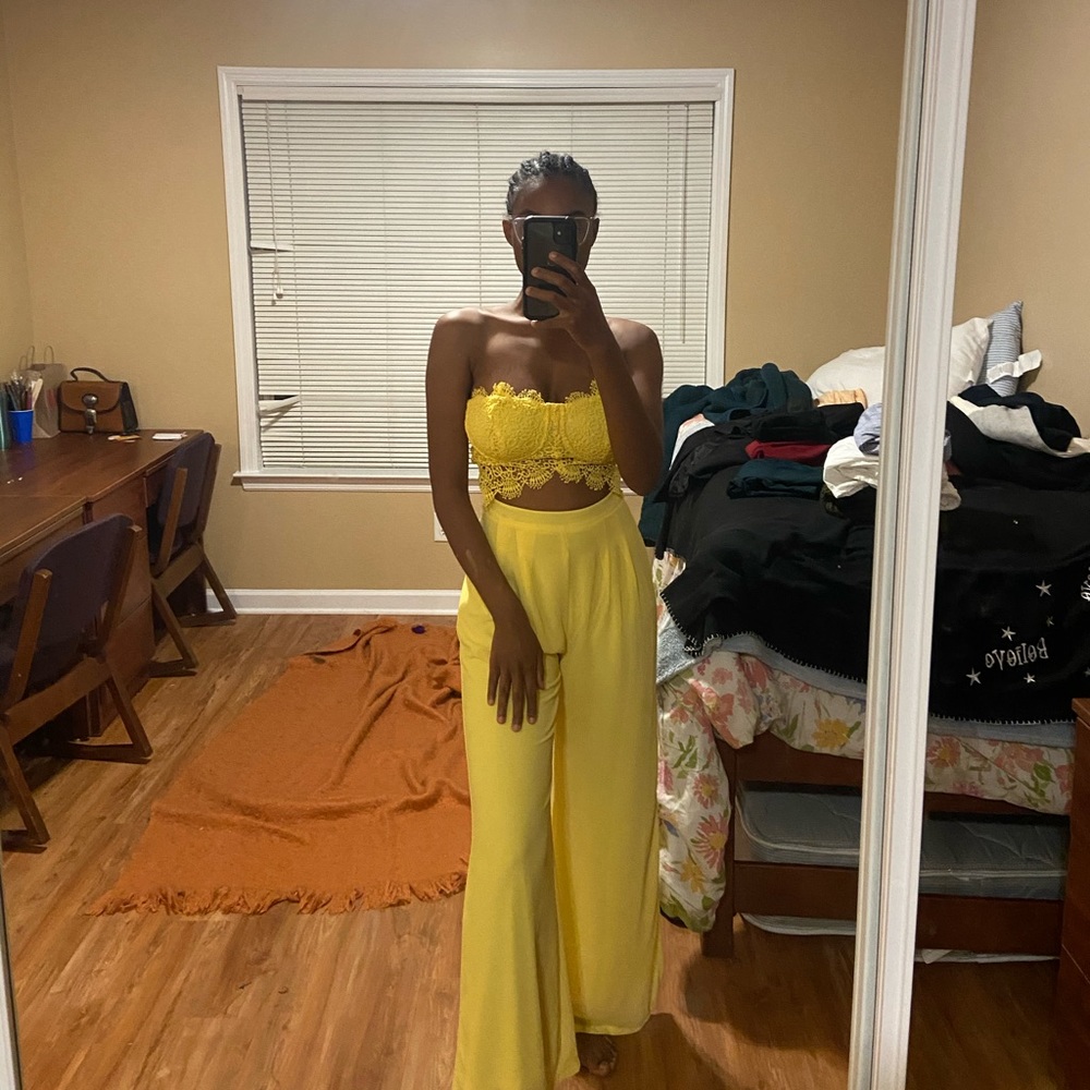 Yellow jumper with cut out detail